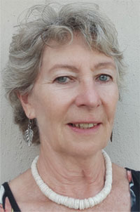 The owner and host at Cliffhanger Cottages: Ingrid Young - part of the warmth of these top-rated Knysna self-catering cottages